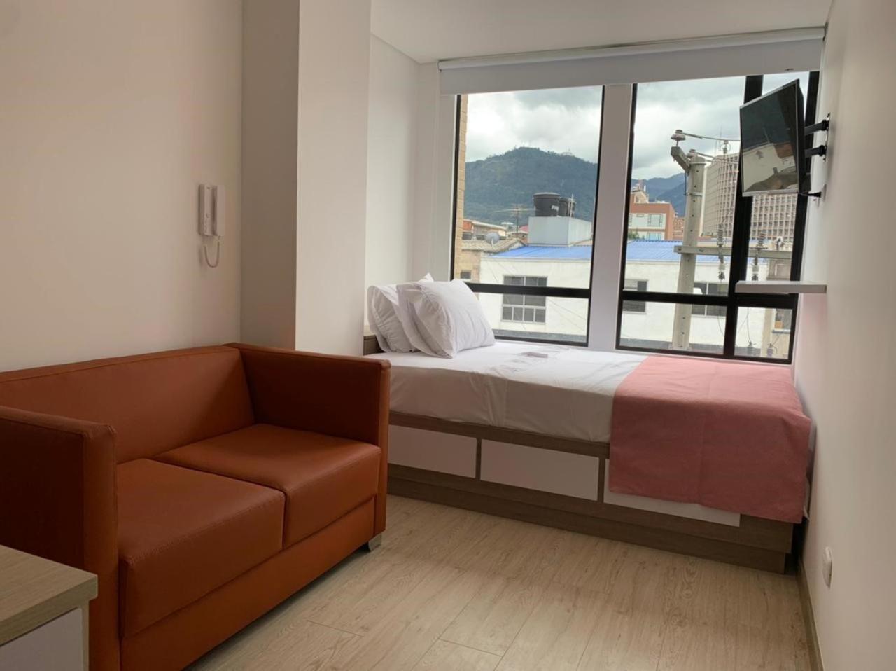 Aparta Estudios Connect Bogotá Quarto foto